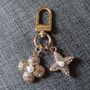 Gold Floral Keychain by Louis Vuitton